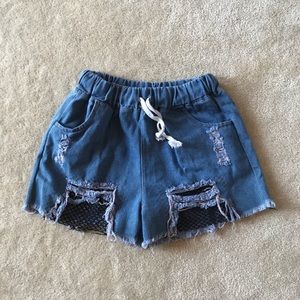 Denim distressed mesh shorts